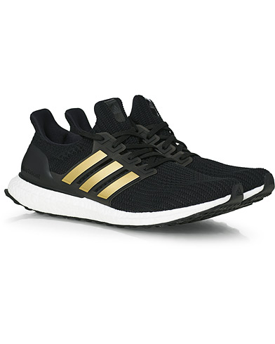 Running sneakers |  Ultraboost 4.0 DNA Sneaker Core Black/Gold