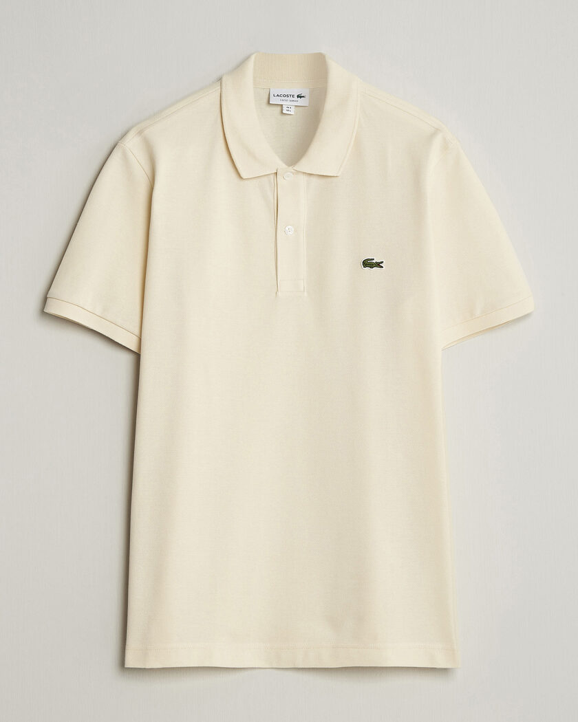 Auralee Wool Rib Knit Skipper Polo Ecru hos CareOfCarl.no