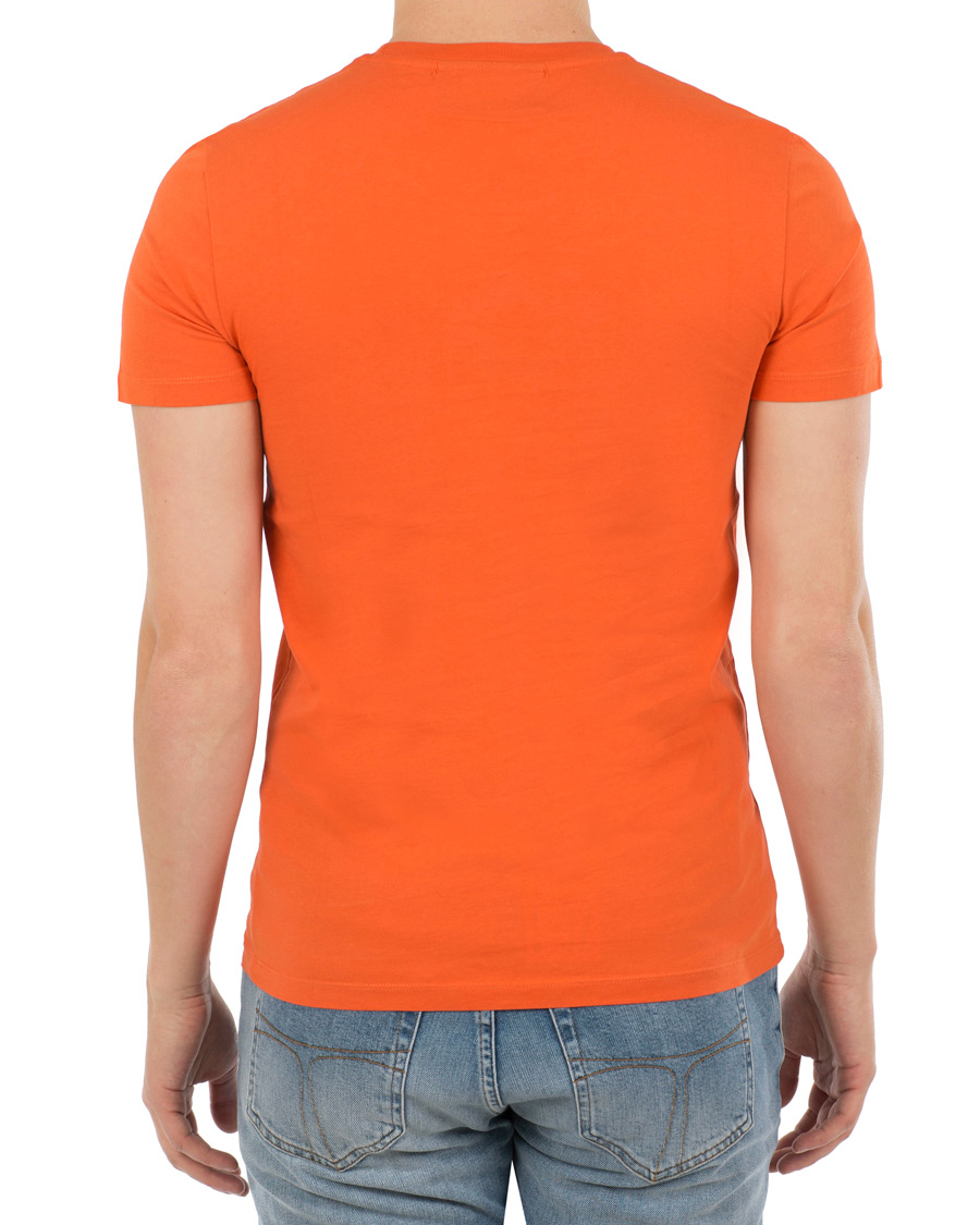 Herre | T-Shirts | Peak Performance | Logo Crew Neck Tee Orange Flow