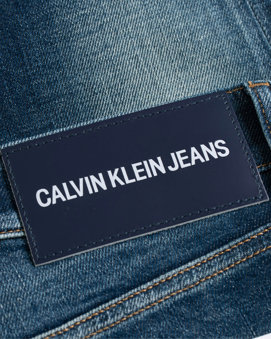 Herre | Jeans | Calvin Klein Jeans | Slim Tapered Shredded Jeans Mid Blue