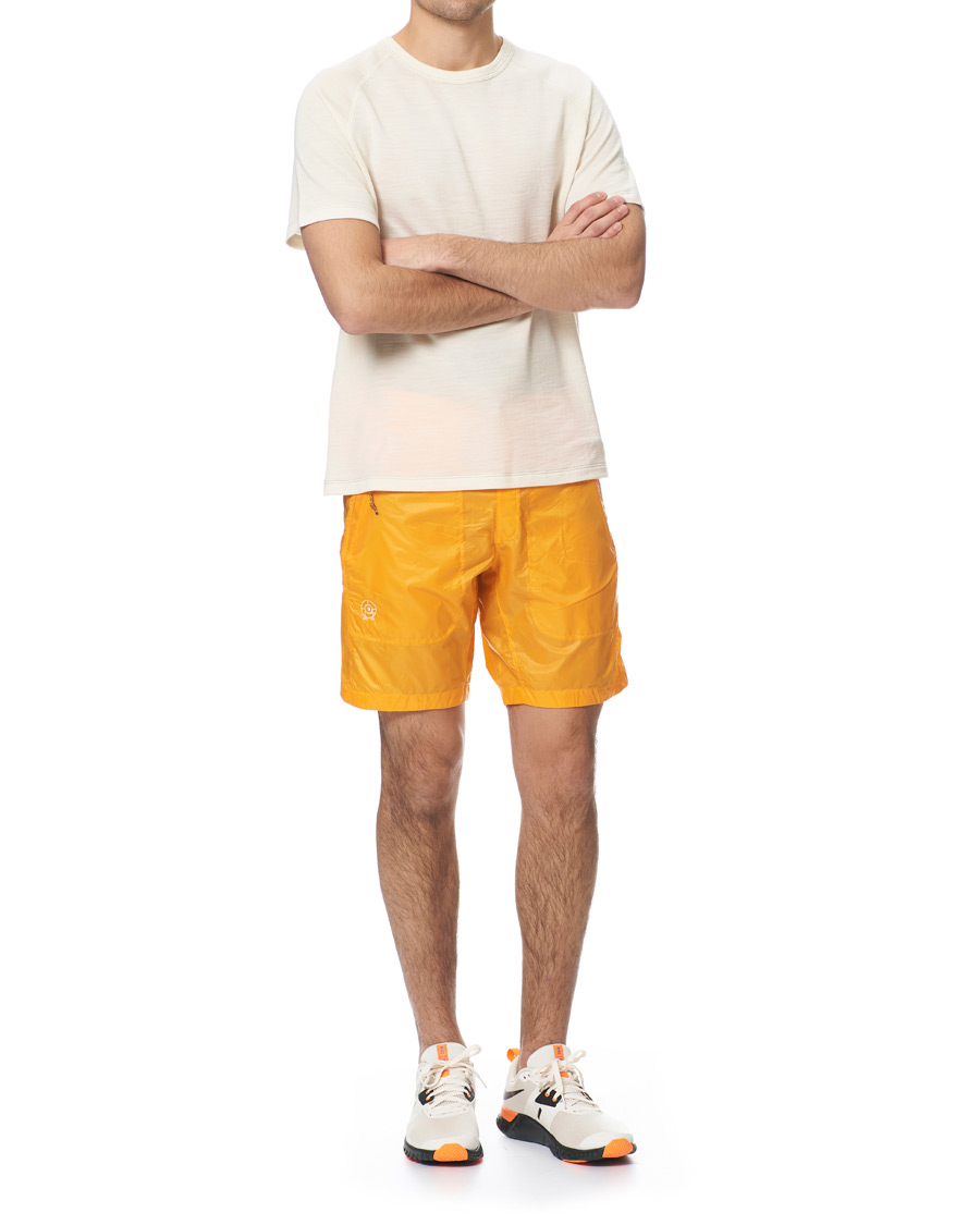Herre | Shorts | Peak Performance | Ben Gorham Windbreaker Shorts Orange