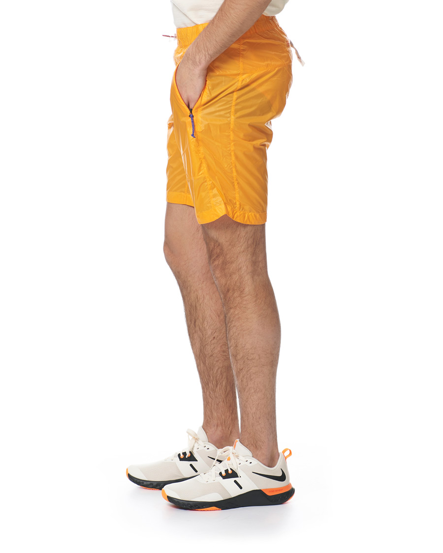 Herre | Shorts | Peak Performance | Ben Gorham Windbreaker Shorts Orange