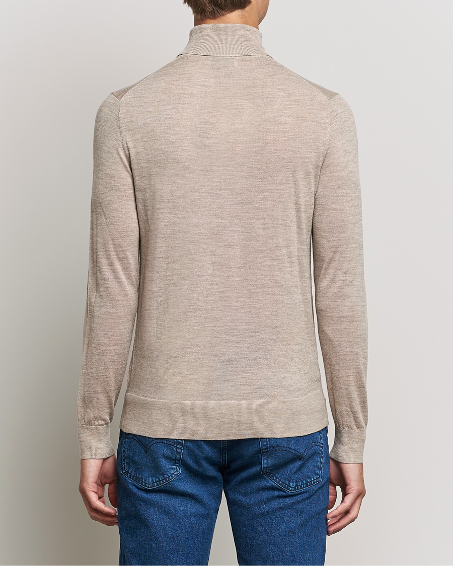 Herre | Gensere | Tiger of Sweden | Neville Extra Fine Merino Polo Beige Melange
