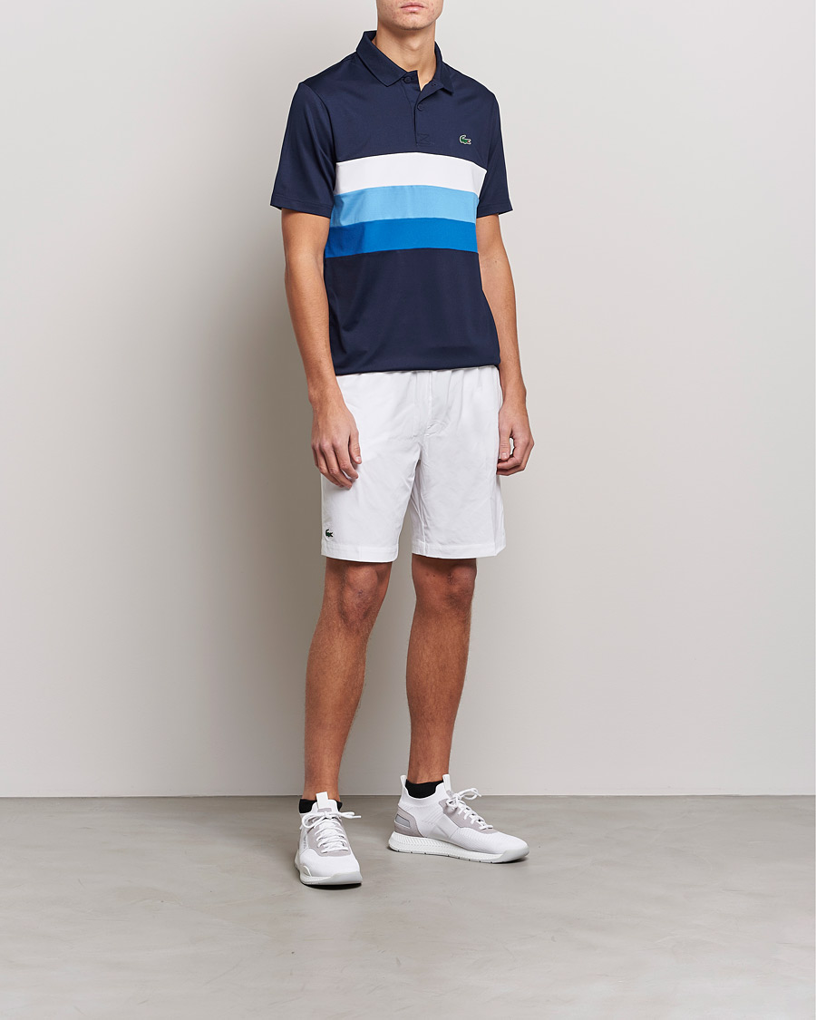 Herre |  | Lacoste Sport | Performance Striped Polo Navy Blue