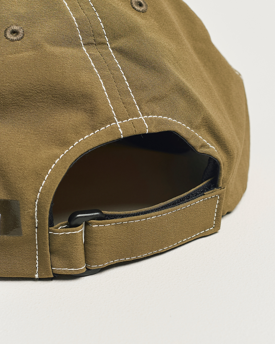 Herre | Satisfy PeaceShell Running Cap Oil Green | Satisfy | PeaceShell Running Cap Oil Green