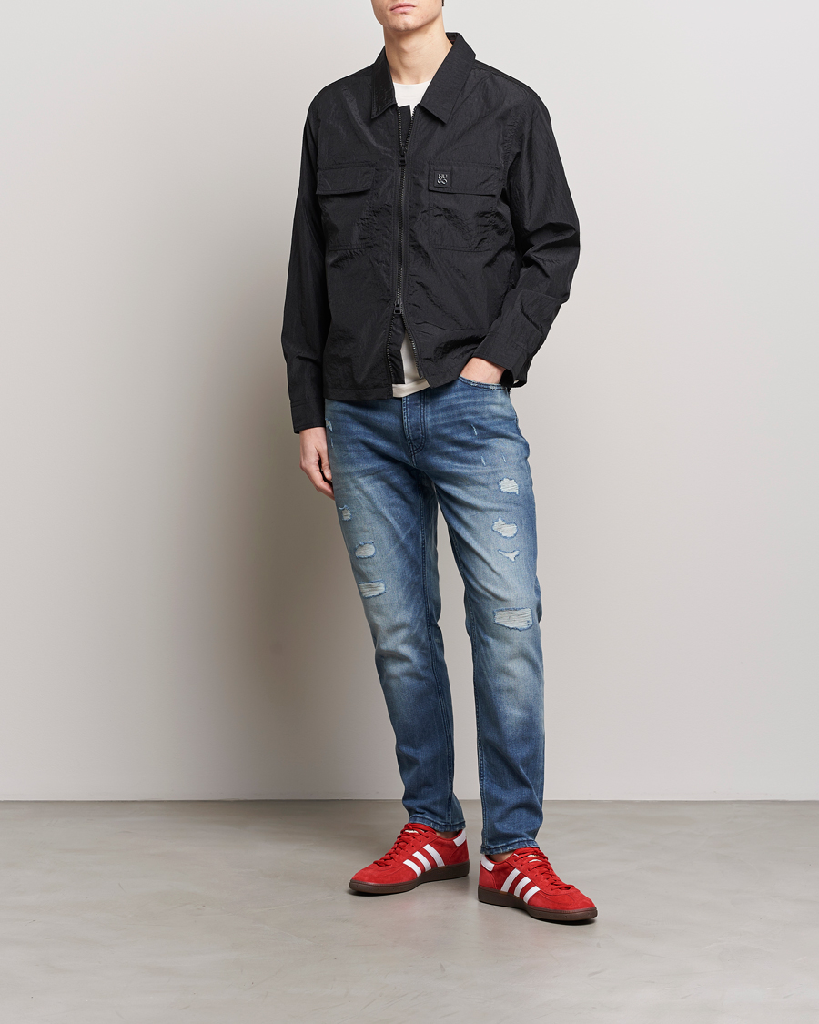 Herre | Jeans | HUGO | 634 Tapered Fit Stretch Jeans Bright Blue