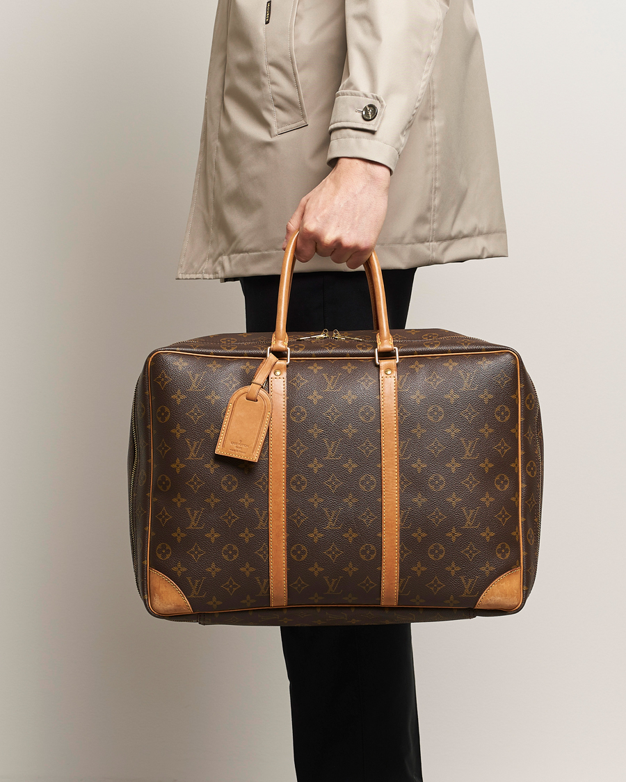 Herre |  | Louis Vuitton Pre-Owned | Stratos Cloth bag Monogram 