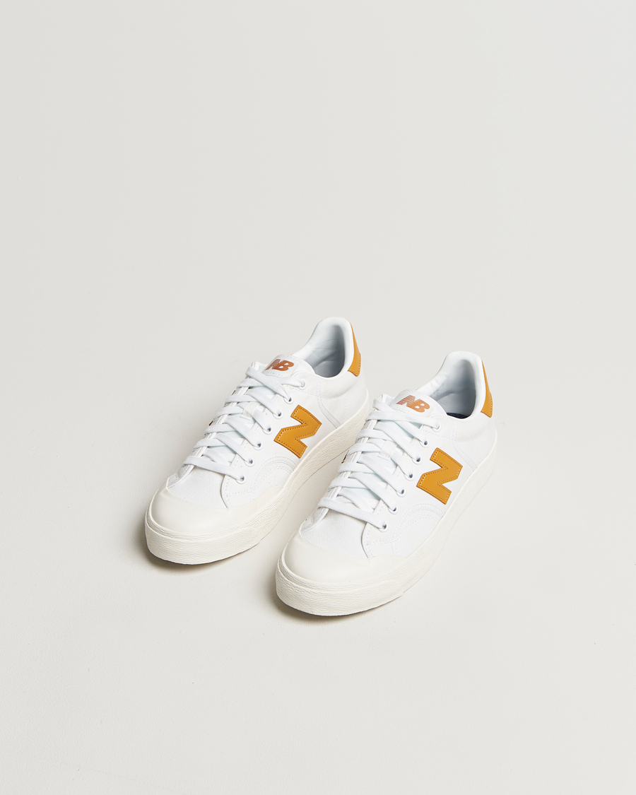 Herre | New Balance B100 Sneakers White/Yellow | New Balance | B100 Sneakers White/Yellow