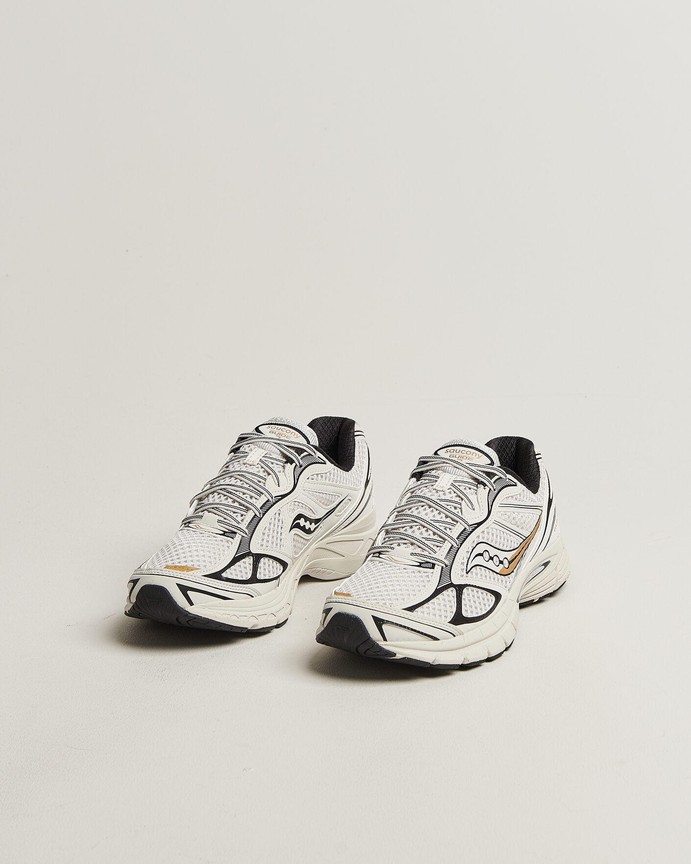 Herre | Sneakers | Saucony | Guide 7 Running Sneaker Onyx/Gold