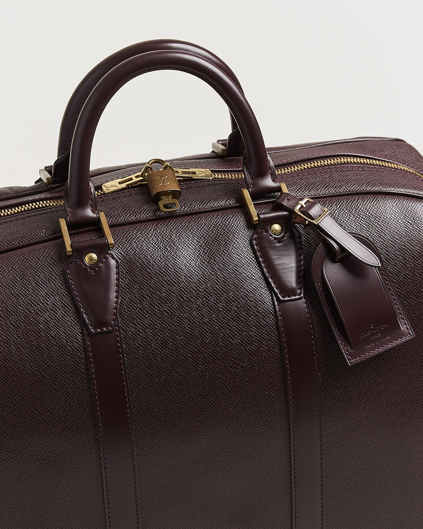 Herre | Pre-Owned & Vintage Bags | Louis Vuitton Pre-Owned | Taiga Kendall Weekend Bag PM Burgundy