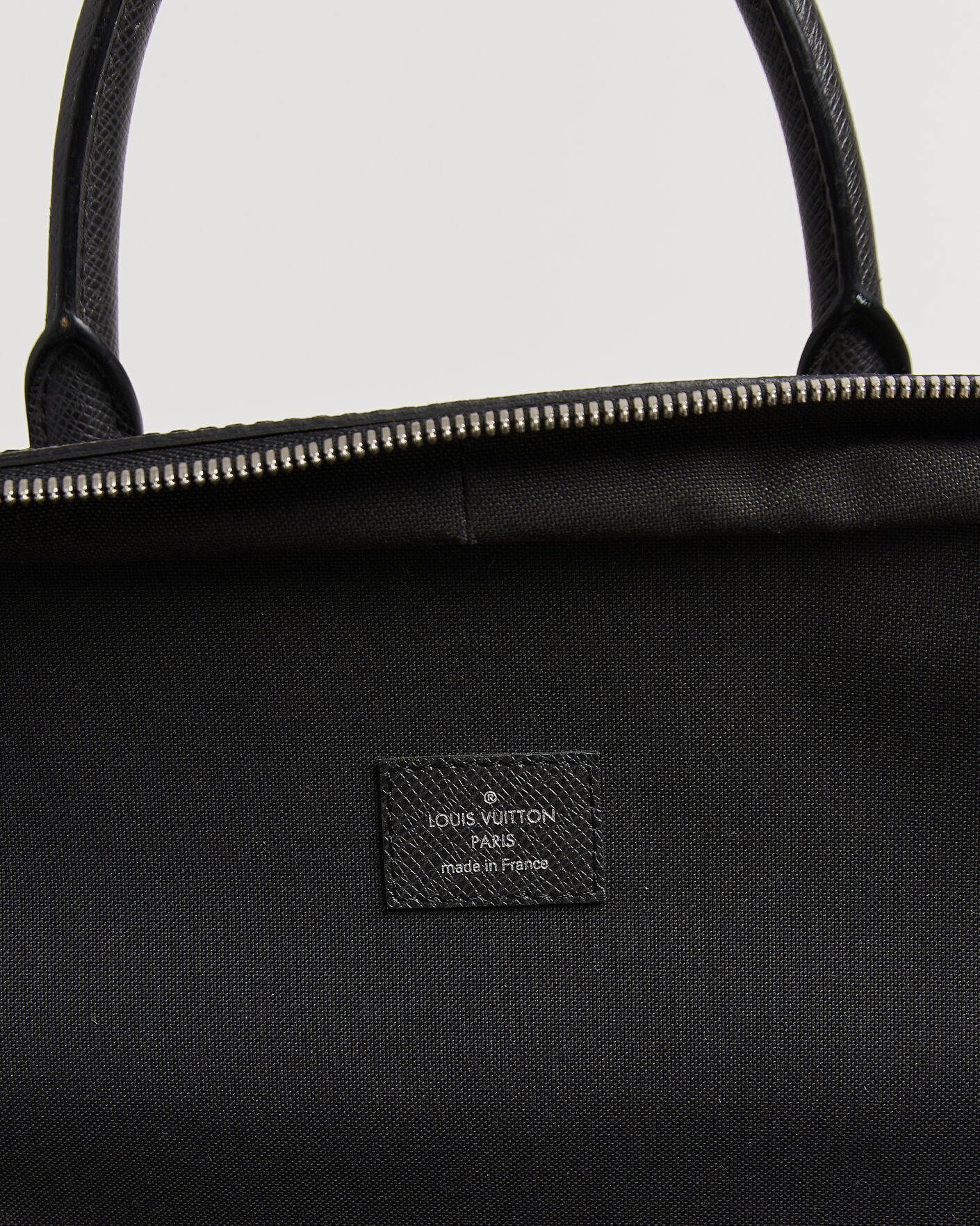 Herre | Pre-Owned & Vintage Bags | Louis Vuitton Pre-Owned | Overnight Bag Taiga Leather Black